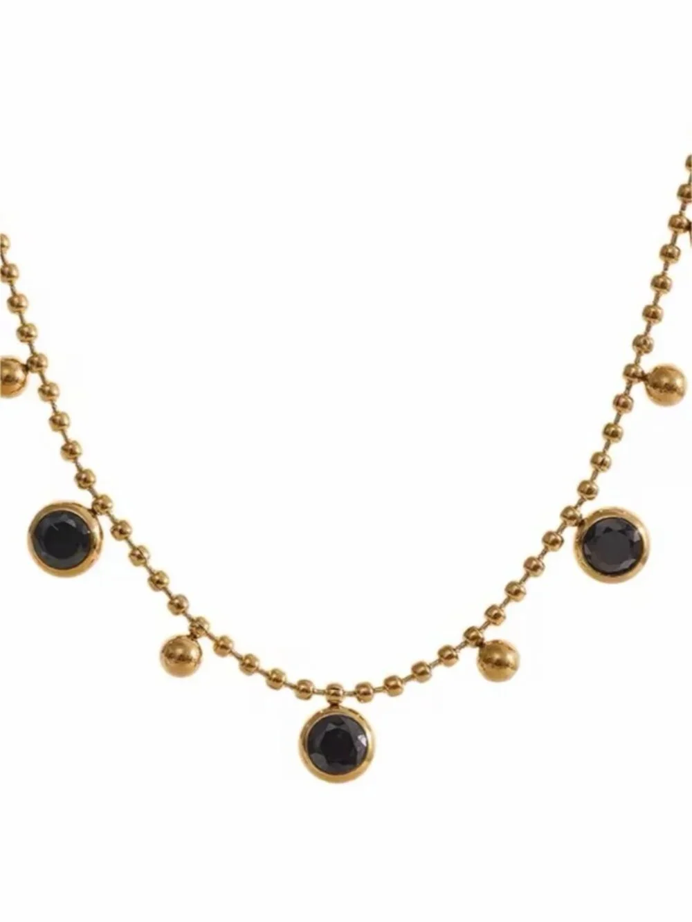 Gold olated Bead Necklace with Black Cabochons